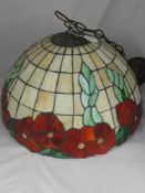 A Tiffany Style Ceiling Light, with decorative red poppies to the borders, Retailer Christopher