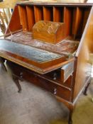 A late Victorian / Early Edwardian mahogany bureau on cabriole legs, the interior fitted with