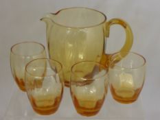 Quantity of Amber Coloured Glass, including jug and six tumblers together with a heavy large