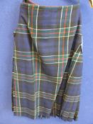 A lady`s Scottish tartan kilt.