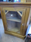A Pine Corner Cupboard, with glazed front and single eternal drawer, est. 76 x 43 x 94 cms.