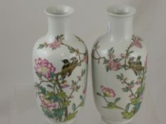 A Pair of Chinese Famille Rose Vases, the vases depict peony and birds with verse to the side of