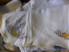 A collection of table linen comprising table cloths, tray cloths, food cloths and mats, some being