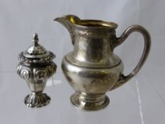 A Solid Silver Continental Cream Jug, the jug stamped 800 to base together with a William IV
