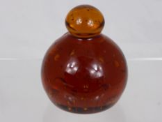 A Victorian Amber Dump Paperweight, with bubble inclusions.