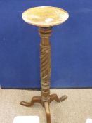 An Oak Jardiniere Stand, supported on a turned column with splayed tripod base, approx 95 cms.