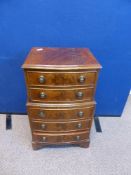 A Miniature Mahogany Chest on Chest, approx 41 x 33 x 73 cms.