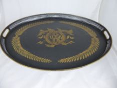 A French Napoleonic style oval tray, ebonised brass with a pierced galleried surround, tray being