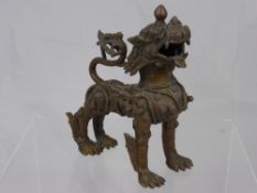 An antique Indian brass Censer in the form of a mythological lion, circa 19th century.