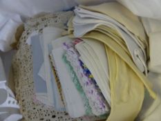 A quantity of Vintage Lace including tray cloths, handkerchiefs, place settings, two pairs of calf