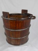 An antique wood and wrought iron pail approximately 30 x 32 cms diameter together with an antique