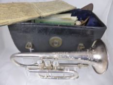 A Boosey & Co Light Valve Cornet, Solbron Class A, in the original case with circa 1940`s music