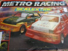 A Hornby  "" Scalextric "" Metro Racing Set comprising track, cars, controllers and transformer (