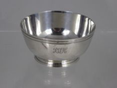 A Solid Silver Bowl with London hallmark dated 1946/47 mm W&W.  The bowl with engine turning to top