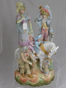 Three `Fairground Fairings` depicting a couple in traditional costume and children riding a horse,