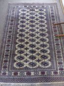 Two Persian Wool Carpets, one having an arched column design to the centre with floral pattern,