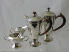 A Liberty & Co Art Nouveau Solid Silver Coffee Set comprising coffee pot, water jug, cream jug,