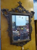 An Antique gilt mirror, approx 48 x 35 cms.