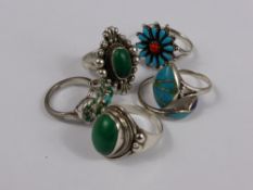 A Collection of Four Turquoise and two malachite solid silver rings (6).