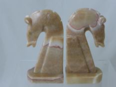 Two Alabaster Bookends, depicting horses.
