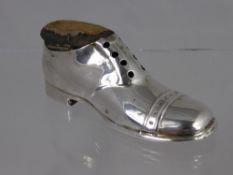 A Solid Silver Novelty Pin Cushion, in the form of a brogue, Birmingham hallmark, dated 1911, m.m