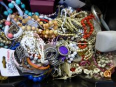 A large collection of Costume Jewellery, primarily necklaces, earrings, brooches, bangles etc...