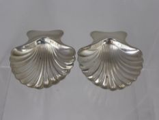 A Pair of Tiffany & Co Solid Silver Salts, taking the form of shells on beaded foot, stamped