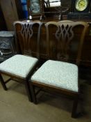 A Set of Six Chippendale Style Chairs, with decorative carving to the back supports and green coral