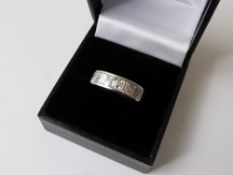A Lady`s 18 ct White Gold Diamond Pave Set Ring. The ring set with baguette and square cut diamond,