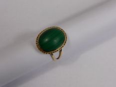 A Ladies 9 ct Yellow Gold and Malachite Ring, size S, Mal 16 x 13 mm, est wt 7.5 gms.