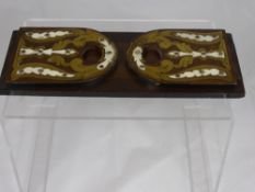 A Victorian Brass and Ivory Inlaid Bookslide.