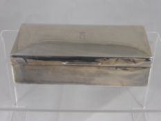 A silver cedar lined cigarette box London hallmark 1916/17, mm PB (rubbed) 20 cms x 8.5 cms,