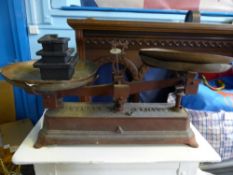 A Pair of Force Vintage Cast Iron Balance Scales, four copper plates together with the original