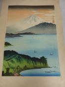 An Original Japanese Chuban Woodblock, depicting Mount Fuji, with publisher mark and artist