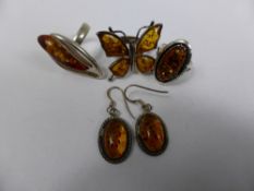 A Collection of Miscellaneous Solid Silver and Amber Style Jewellery, including three fancy rings