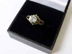A Lady`s 9ct Emerald and Diamond Ring, size O, approx 2.2 gms.