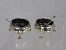 A pair of Georgian Solid Silver salt cellars with matching spoons, approx. 126 gms.