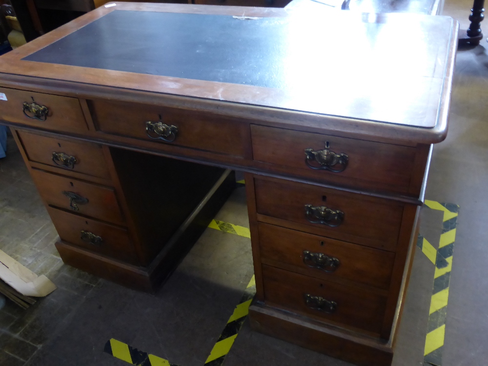 An Edwardian Mahogany Twin Pedestal Desk, brown leather insert, approx. 123 x 65 x 75 cms.