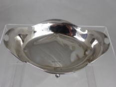 A Solid Silver Bon Bon Dish, with unusual decorative sides and mollusc feet, Sheffield hallmark,