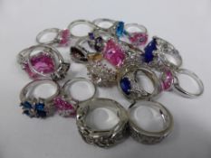 A Miscellaneous Collection of Silver Metal Costume Jewellery Rings of various colours, approx 18