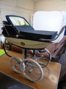 A Vintage Navy Silvercross ""Millenium"" Dolls Carriage, a limited edition model nr 475, with the