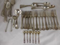 A quantity of shell pattern silver plated flatware, comprising seven tablespoons, one ladle, nine
