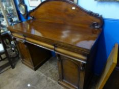Victorian Mahogany Side Board, twin pedestal three drawers, cupboard to each side, arched gallery