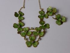 A Lady`s Shamrock Necklace and Pendant on 9 ct gold chain.