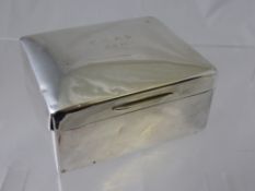 A Solid Silver Cedar Lined Cigarette Box, London hallmark dated 1919, est wt 240 gms (WAF).