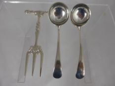 A Pair of Solid Silver Sauce Ladles, Sheffield hallmark, dated 1928 together with a pickle/meat