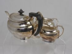 A Silver Plated Scottish Tea Set by Cameron Kilmarnock, including teapot, sugar bowl and milk jug