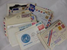 A bundle of stamps on cover, 1930`s - 1950`s, GB and USA.