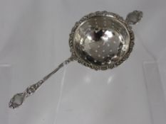 A Solid Silver tea strainer with Cheotes hallmark dated 1908 M.M.R.P. approx. 26 gms.
