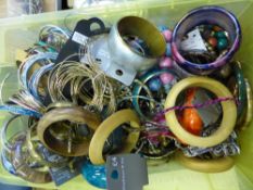 A large collection of Costume Jewellery, primarily bangles, bracelets and some necklaces.